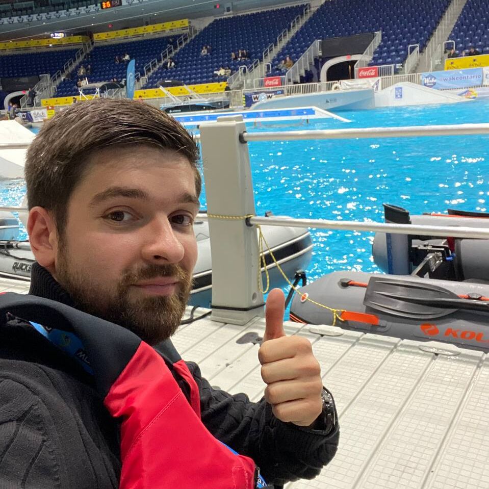 Thumbs up at the M-Oceans booth during Toronto Boat Show 2025, showcasing inflatable boats and electric motors