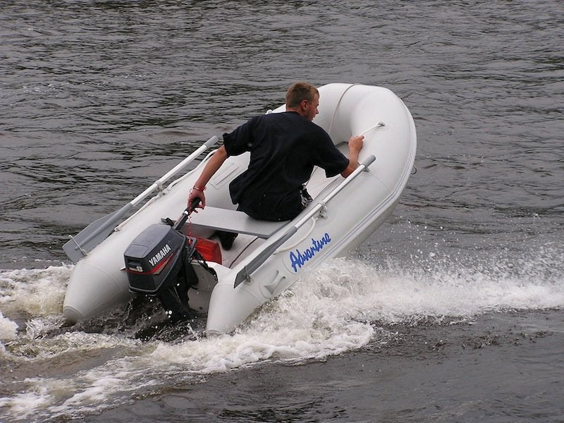 Boat Adventure Vesta V-250 on Water Back