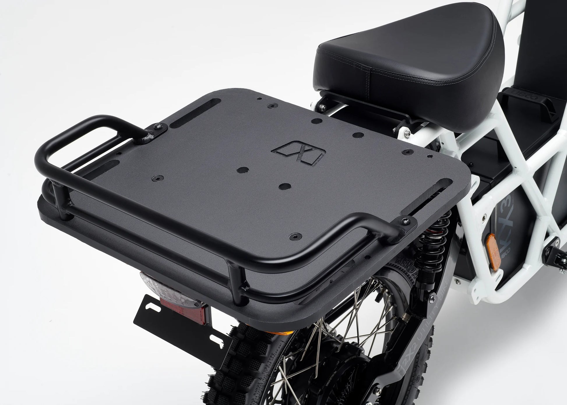 UBCO 2X2 Rear Cargo Deck in Black mounted on the bike