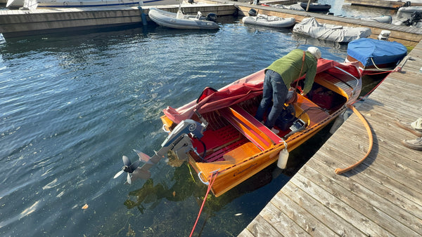 Canadian Challenger at the marina dock during the electric outboard setup