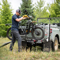 UBCO 1UP XTREME DUTY SINGLE with eBike on it mounted on the car