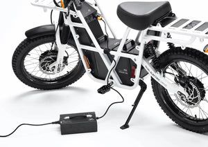 UBCO 7 Amp Charger charging the eBike