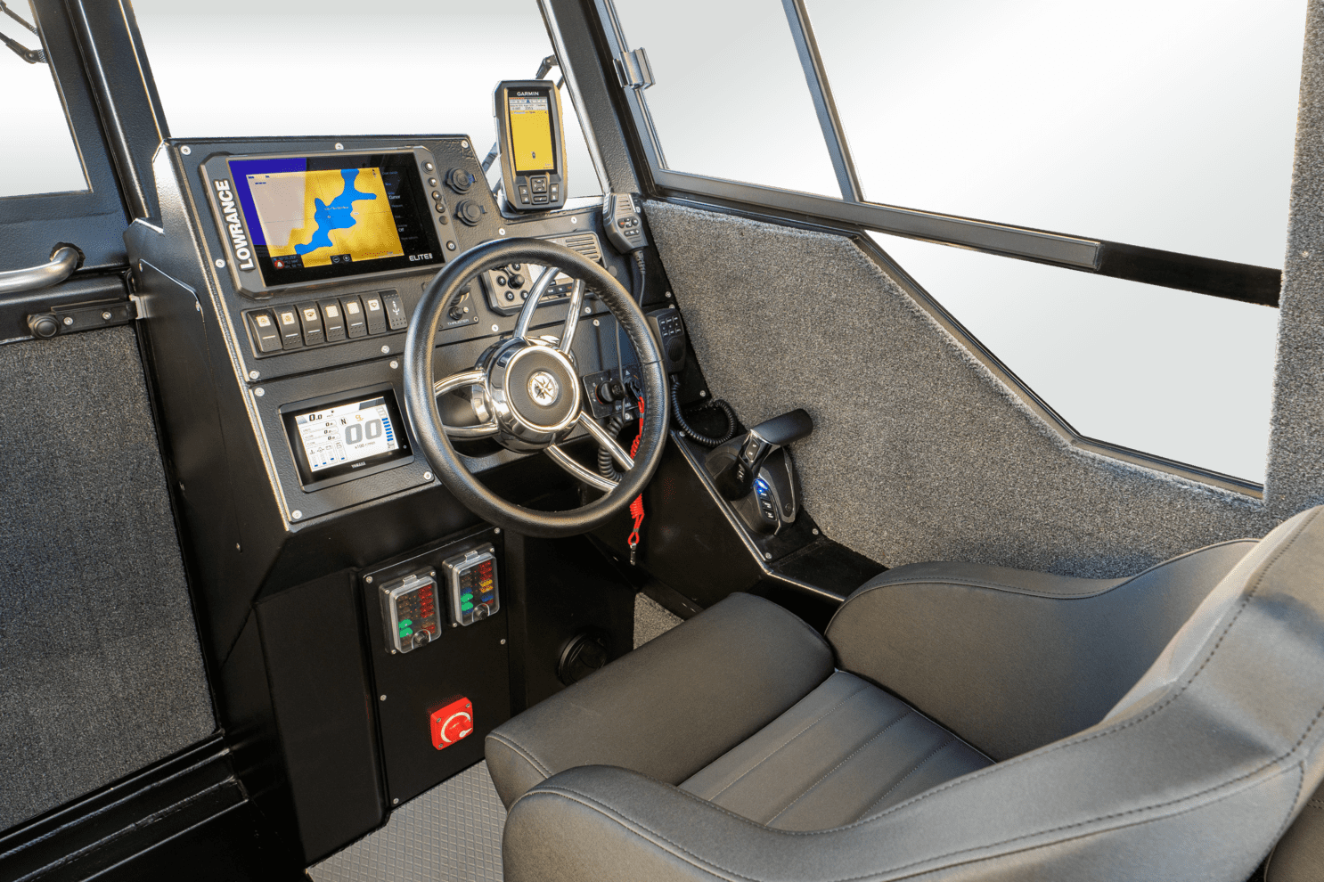 Driver`s seat of the Aluminum boat UMS 700HT 23.5ft 