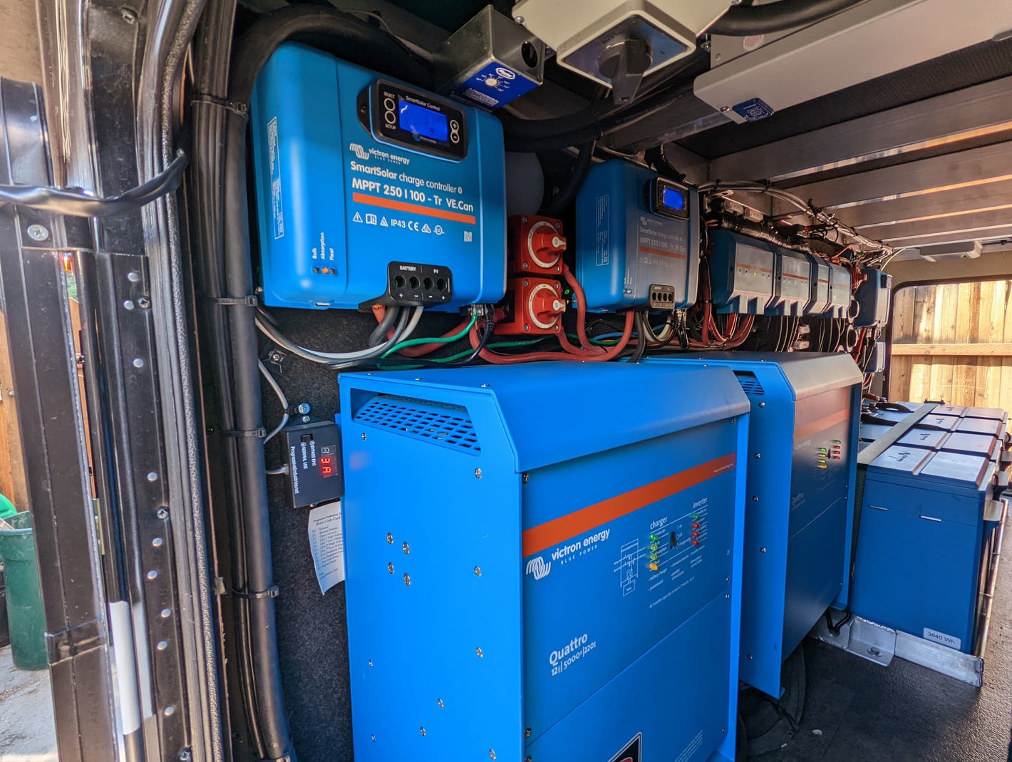Electrical components including inverters and batteries inside a vehicle or machinery.