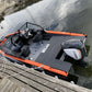 Overhead view of the UMS 585DC fishing boat docked.