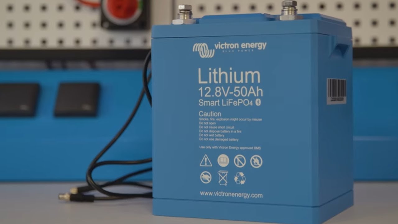 Blue Victron Energy lithium battery with visible branding and specifications.
